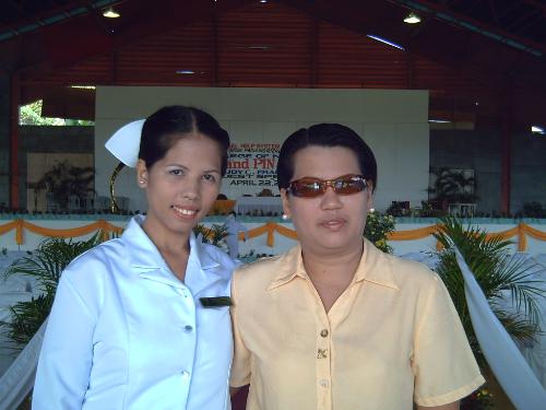 with my mother during my graduation - this was taken during my clinical graduation
