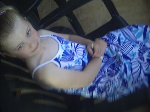 my six year old, going on 25  - here is my six year old posing for her picture taking