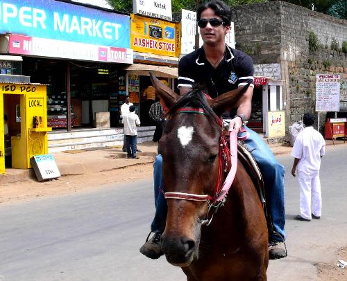 me on horse back - me horse riding on a hill station