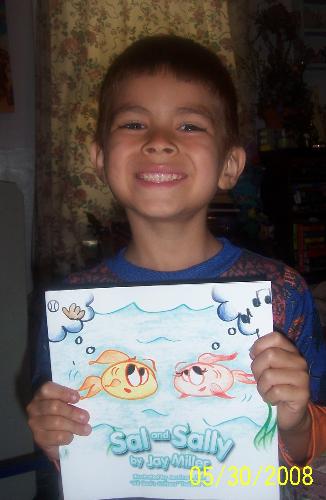 My grandson with his new book, Sal and Sally by Ja - It's such a cute book and the boys really enjoyed it. This is my middle grandson holding the book, he's 6.