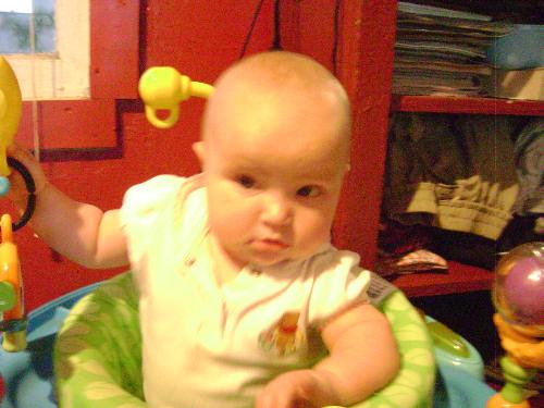Allie - Allie was sitting in her new bouncer. She loves that toy.