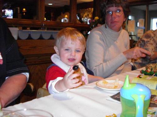 Austin eating an olive  - Austin eating an olive during dinner