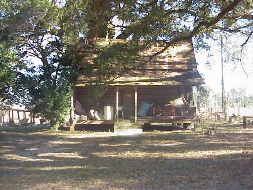 The old log cabin - This cabin was built in the middle 1850s. I think just about all of my husbands family lived in it at one time or another.