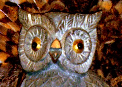 Close up of owl carving - This photo was taken on a macro lens and is just of of many within my collection of owls.