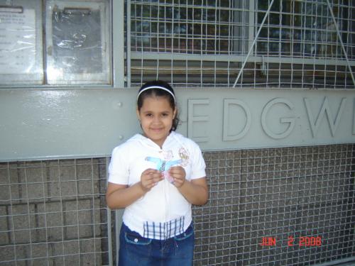 raven holding flat stanley - my 8 yr old daugther holding flat stanley