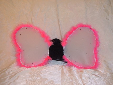 Child sized wings - I make these with a wire frame and nylon material. Then what ever adornment I feel the particular set needs. Every pair Child or adult sized I make are ready to be worn. They are too much fun to make and twice as much to wear. I have a few pair that I'm keepind all to myself.