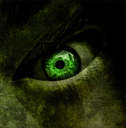 Green Eye - Dark eye with green pupil.