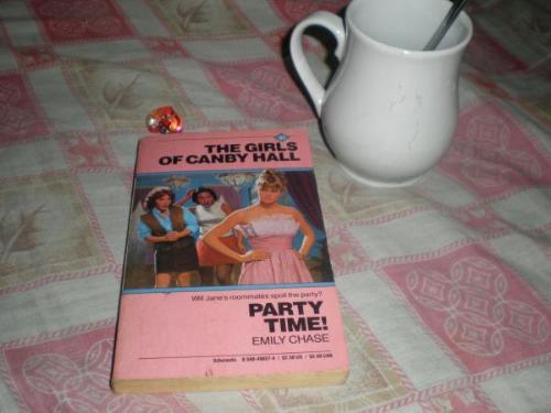the perfect midnight snack... - ...a mug of milk, and my favorite book... im a BIG fan of the canby hall girls series!