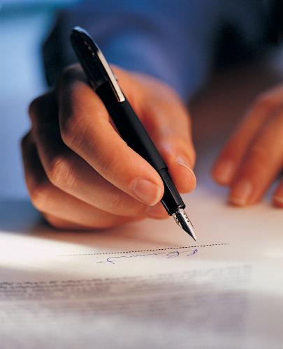 Examination - A man writing/making his examination.