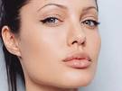 Angelena Jolie - Okay, so maybe she does go a little thick with the eyeliner. But then again a little theatrics works well with her. And, who can complain?