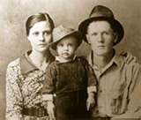 Young elvis -  This has always been my favorite picture of Elvis with his mom and Dad.
