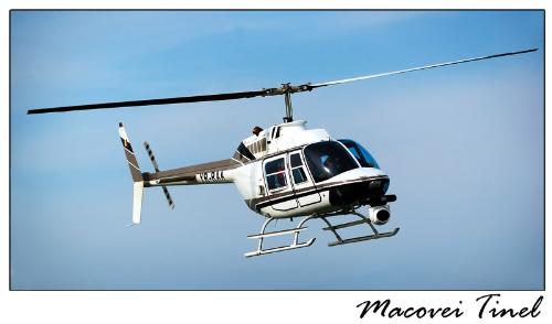a helicopter - a helicopter flying over the black sea