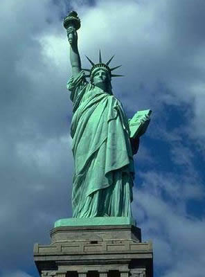 The Statue of Liberty - Statue of Liberty on Ellis Island  “Give me your tired, your poor, Your huddled masses yearning to breathe free, The wretched refuse of your teeming shore. Send these, the homeless, tempest-tost to me, I lift my lamp beside the golden door!”