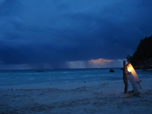 Rainy Boracay Sunset - They said part of Boracay's charm is the sunset by the beach. What do you know, even a rainy sky didn't get in the way of that.