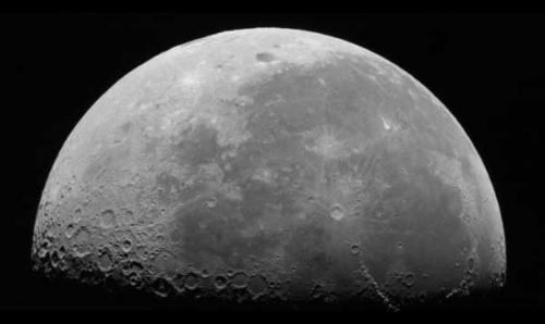The moon - a planet that can be seen from earth at night time.