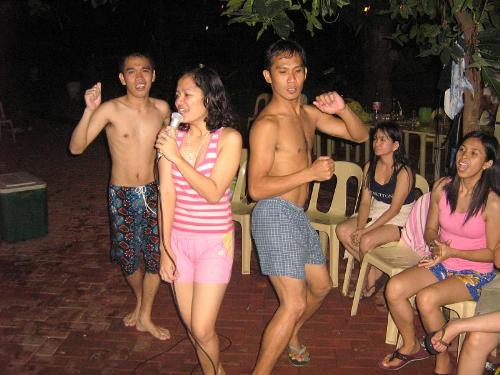 championship party - pong and me dancing side by side. pool party at the flamengo garden resort in Marikina City, June 6, 2008, celebration for winning the championship on volleyball and basketball
