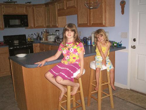 My girls - My two girls sitting in the kitchen.