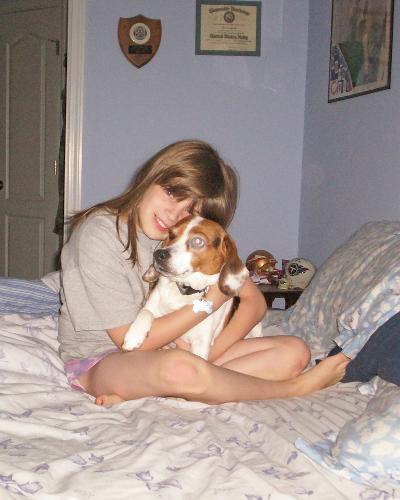 My oldest with Ladybug - My oldest, Shelby with our beagle, Ladybug.