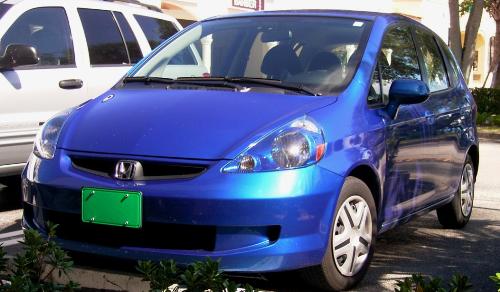A Blue Honda Fit with the Eco Green License Plate - A Vivid Blue Honda Fit with the Environmental Green License Plate by EarthRehab. EarthRehab retails the Green License Plate online with proceeds to benefit the most productive Environmental Foundations and Sanctuaries. Visit EarthRehab.com today and see who is involved.
