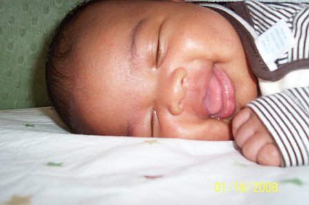 Smiling while sleeping! - Just my happy son smiling while sleeping! So adorable!