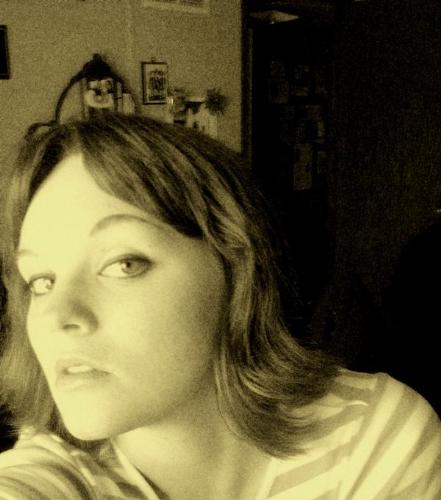 me! - I used Picasa to do the nifty old-looking veneer on this. Pretty sweet!