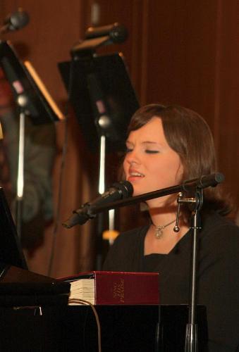 piano - Me, singing and playing a song at church.