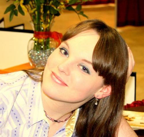 Me - Before I had my major haircut.