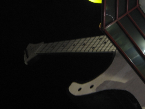 giant guitar - in Mcdonalds restaurant at Surabaya city, there is a giant guitar for accessory at the roof