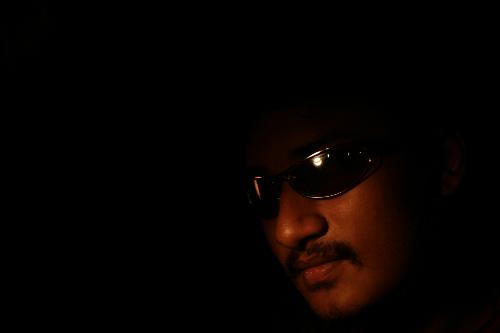 Dats Me...!!! - Dis Photo was shot n a photography lab by my frnd....he was tryin 2 shoot only d light from my glasses but den due 2 a lucky mistake a bit of my face came in 2...lollzzz....