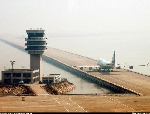 strange airports - God help the pilot and help every one in this trip this is a pic for Macao International Airport