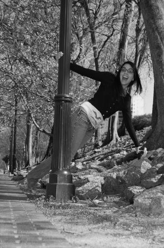 Im having fun at the river walk - my sister and my family were having fun by the river...posing and having good times!! swinging around a light post!