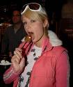 Paris Hilton Sucking Popsicle - Paris Hilton sucking a popsickle.  Paris is hungry in this picture.