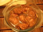 chicken adobo - a filipino dish with soy sauce and vinegar..some adds laurel leaves to smell good