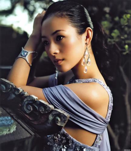 Zhang Ziyi - Waiflike, ethereal and yet somehow a martial arts film favorite, Zhang Ziyi played high-kicking, fist-fighting heroines in Crouching Tiger, Hidden Dragon (2000) and House of Flying Daggers (2003). Zhang was born in China and spent six years at the Beijing Dance Academy before switching to acting studies at the Central Academy of Drama. Her first leading role was in the poetic village romance The Road Home (1999), and one year later she landed a high-profie part as the aristocratic (and acrobatic) young rebel Jen Yu in Ang Lee's hit Crouching Tiger, Hidden Dragon. The role brought Zhang to the attention of international audiences, where her porcelain good looks and steely undertones proved to be a popular combination. The next year she co-starred with Jackie Chan in the action comedy Rush Hour II, and in 2004 she played a mysterious samurai-like courtesan in the art house action film House of Flying Daggers. Zhang and her Crouching Tiger co-star Michelle Yeoh reunited for the Hollywood film Memoirs of a Geisha, due for release in 2005.  Early in her acting career, Zhang's slender build and star quality earned her the nickname 'the little Gong Li.'    - answers.com