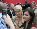 Paris Hilton camera phone - Paris Hilton picture on a camera phone.  Paris Hilton in this picture is on the red carpet for her video premiere.  Paris is the famous heiress.  S