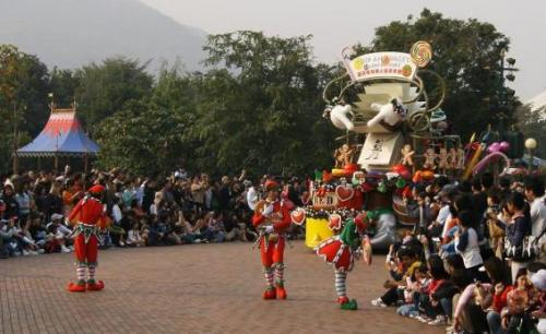 People in the Park - People in the park watching parade.
