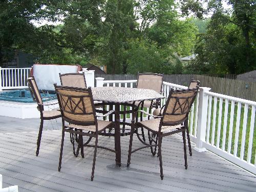Deck furniture - Seats 6 and has an opening for an umbrella.