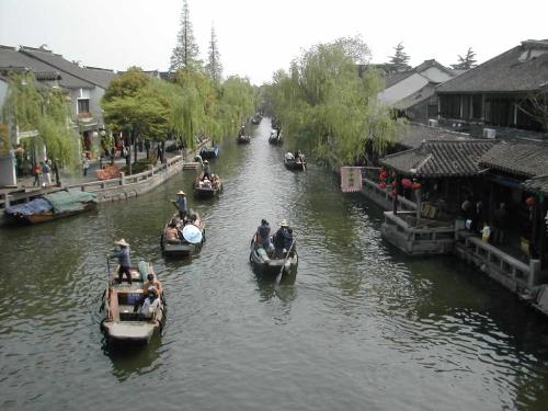 A beautiful city - many people say there is a paradise in Sky,Suzhou and Hangzhou on earth',that means both of cities are really like paradise.I like these peaceful cities,they are so charming.