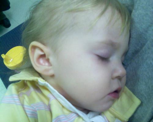 kenzel sick with the flu -  you can really tell how sick she was. her skin was discolored. and her eyes lined red:( poor baby