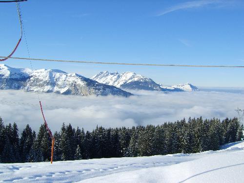 Snowy Mountain Landscape - A snowy mountain landscape. Taken in the French alps in the Grande Massif area. Beautiful blue sky highlights the pureness of the snow