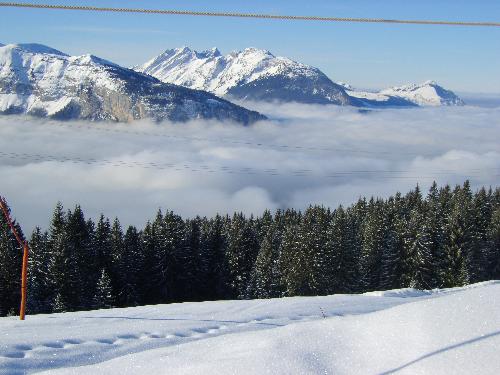 Snowy Mountain Landscape - Snowy mountain landscape taken in the Grande Massif area of the French Alps. Taken on a beautiful sunny day which highlights the pureness of the snow.