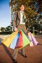 compulsive buyer picture - compulsive buyer with lots of shopping bags picture