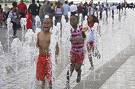 Kids at play, a good way to learn - This is a photo of kids at play in a fountain. What fun and play is a great way to learn, better than TV!