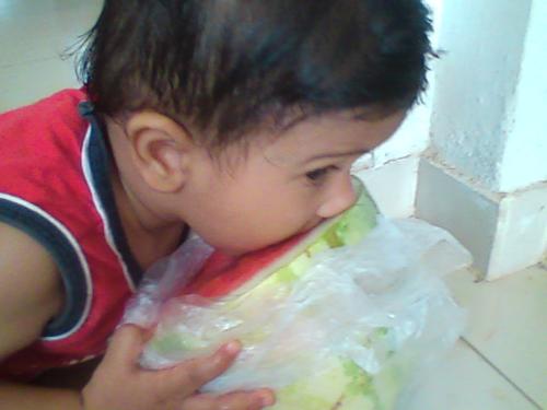 Eating watermelon - Thats my kid eating watermelon....