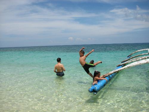 The Plunge! - The kids are enjoying the crystal clear ocean.