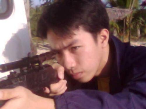 My Photo 'Sniper' - This was taken on a beach with my friends. We we're just playing an airgun :)