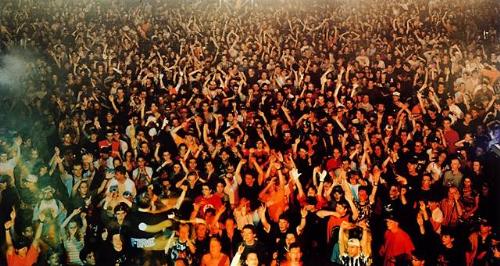 rave - a bunch of people dancing in a rave