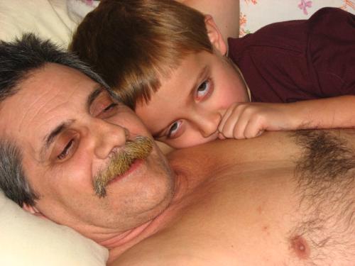 Candid Shot - Grandpa bob getting woke up by grandson.