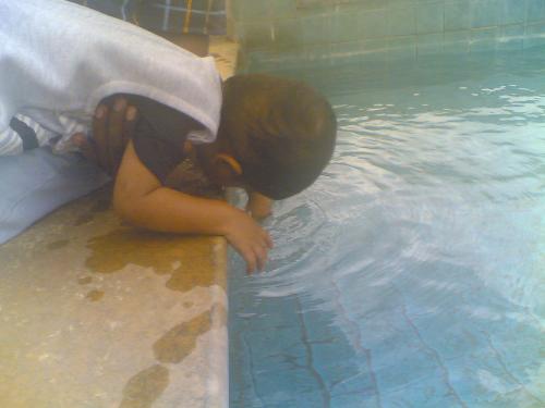Kid in the water - Thats my kid playing in the water when we had been to an office. Kid in the water - Thats my kid playing in the water when we had been to an office.