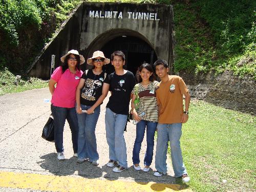 outside the malinta tunnel - we have just got out of the malinta tunnel in corrregidor. we have been there for the lights and sound show,it was really dark inside and you can see some statues of our former president manuel luis quezon with his family,gen. douglas mc. arthur,nurses and soldiers that were wounded during the war.